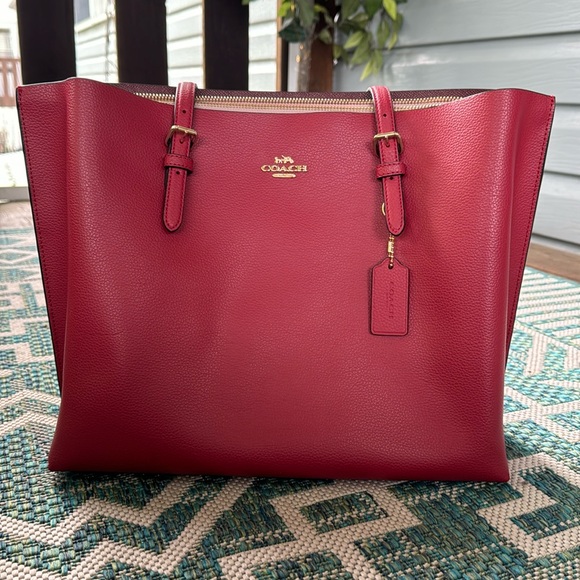 Coach Handbags - Orange leather Coach Tote